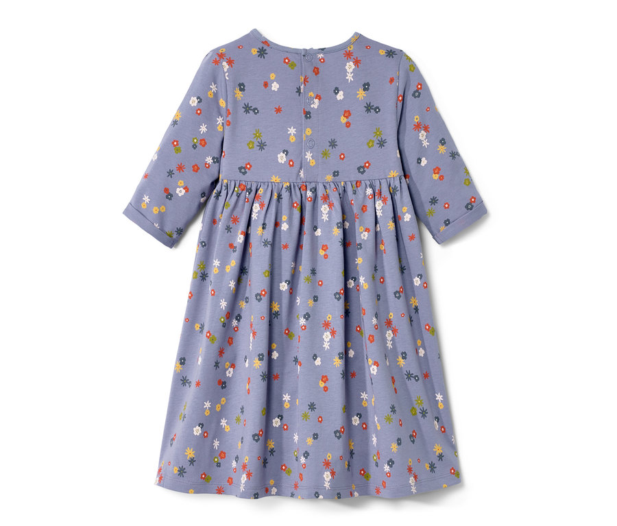 Ein blaues Baby-Jerseykleid mit Allover-Blumenmuster.