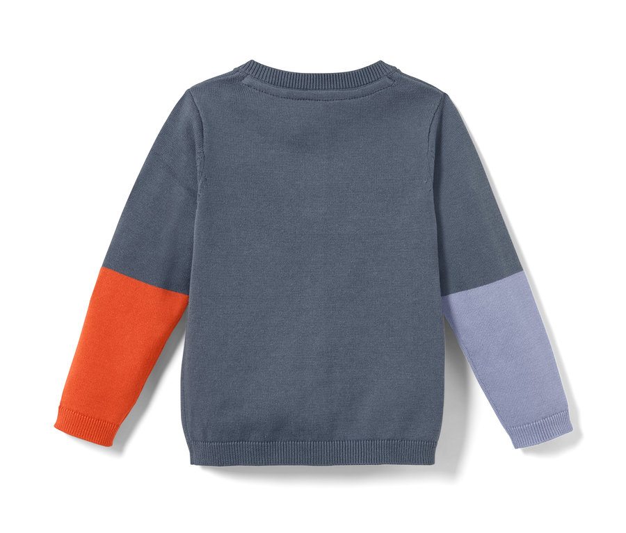 Detailansicht einer Kleinkinder-Strickjacke im Colorblocking-Design.