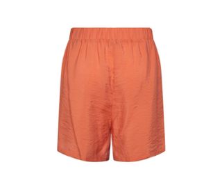 Detail einer apricotfarbenen Shorts.