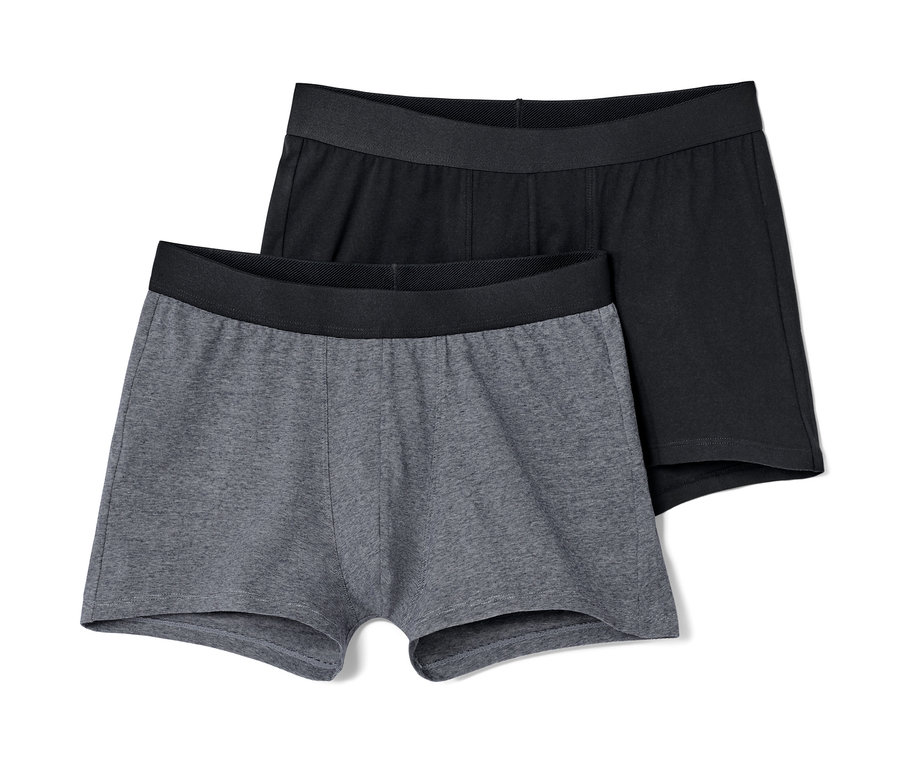 Zwei Slipboxer, eine grau, eine schwarz.