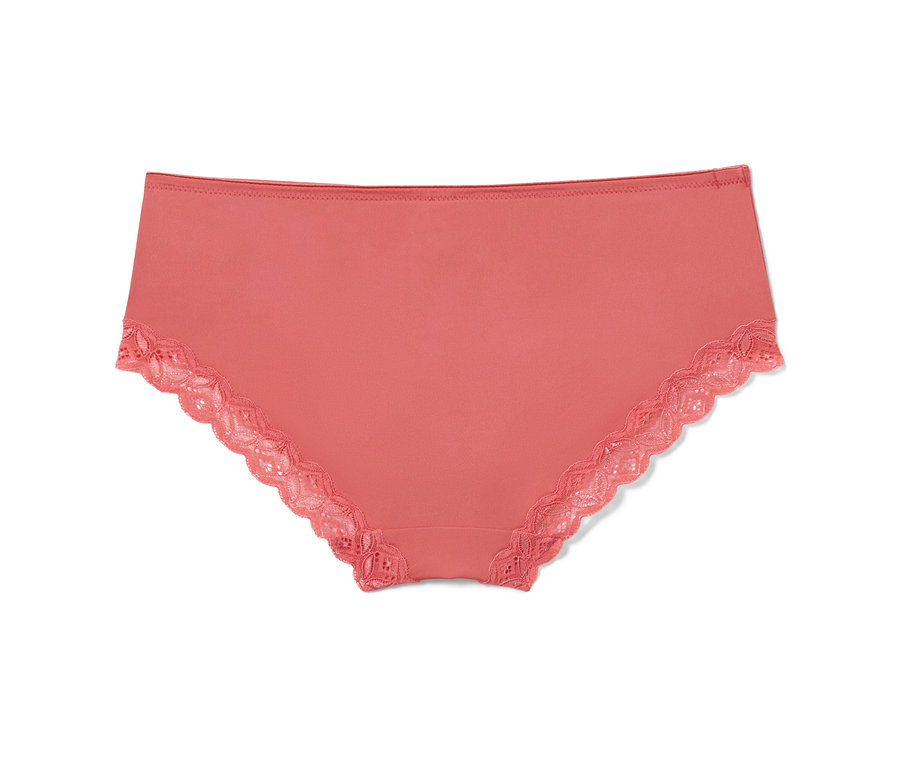 Detailaufnahme einer korallenroten Panty mit Spitze.