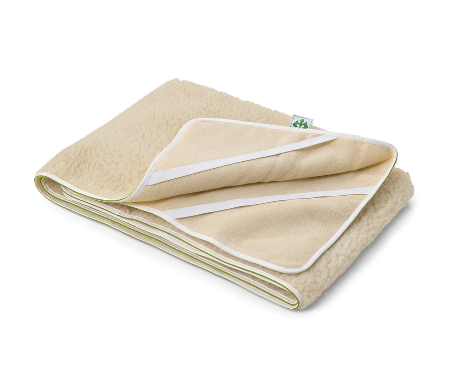 Zusammengelegte irisette® greenline Matratzenauflage.
