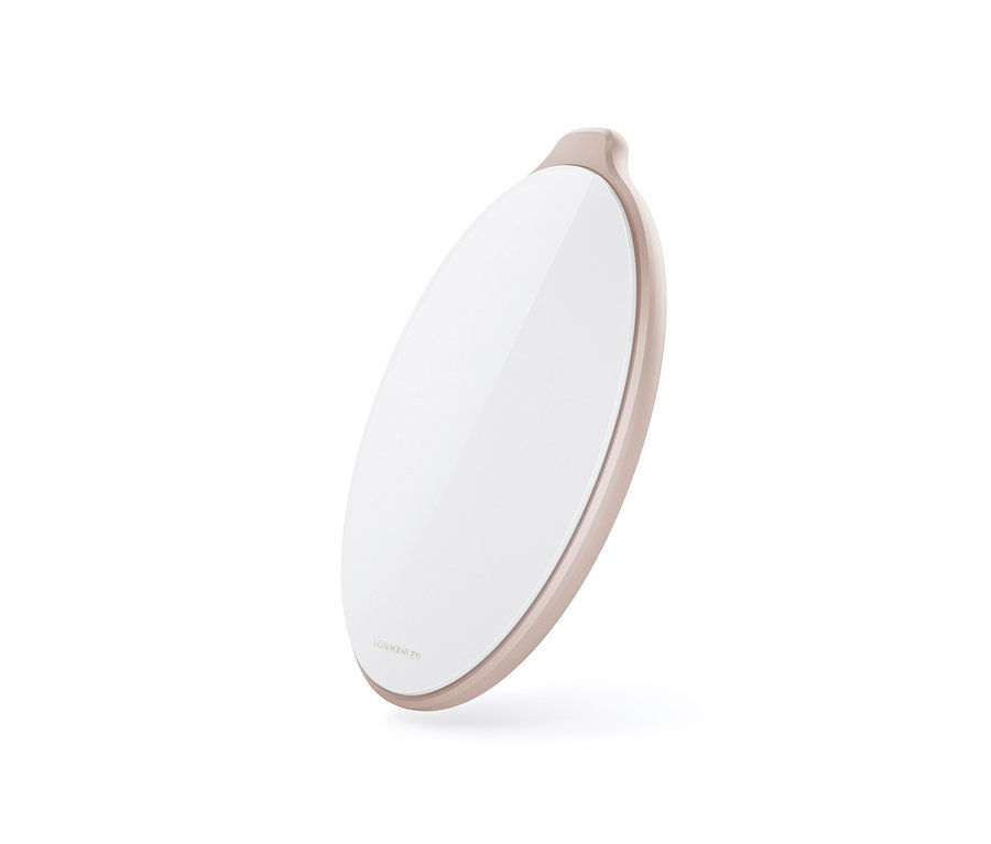 Ein beiger Vonmählen »Aura®« Wireless-Charger in ovaler Form.