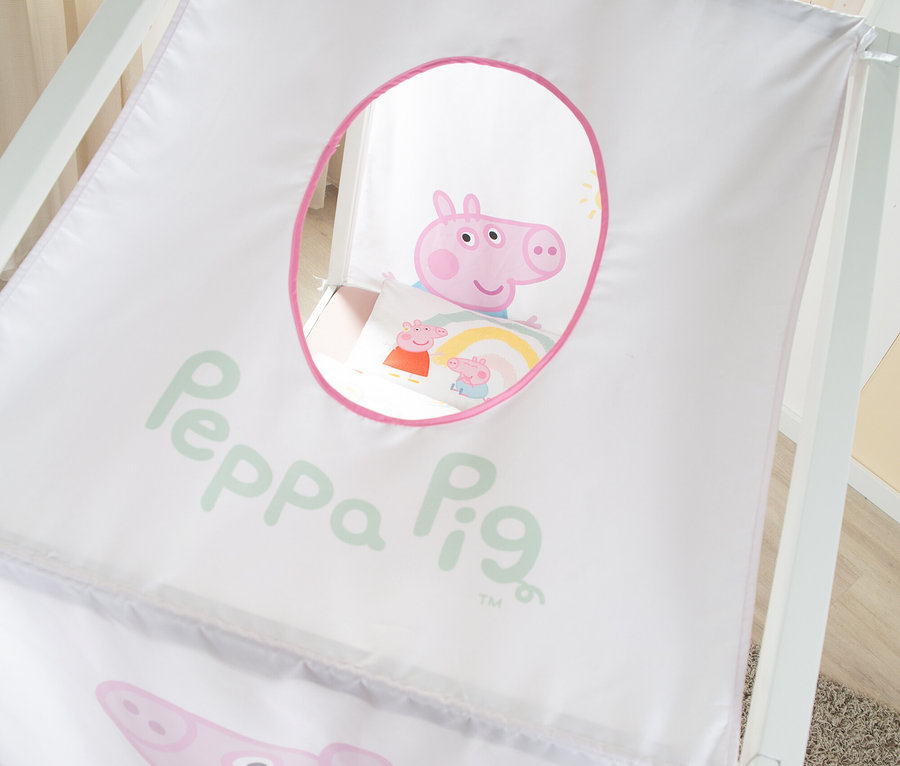 Detailansicht eines weißen Kinderbetts mit Peppa Pig-Motiv.