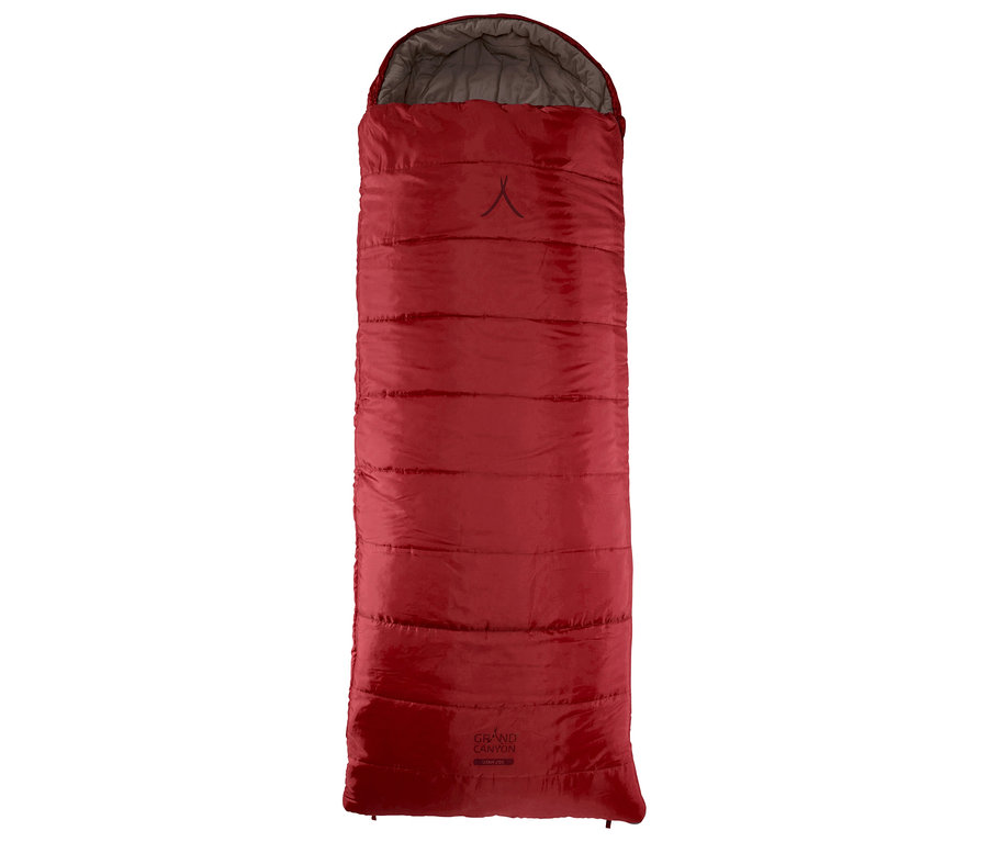 Der rote Grand Canyon Schlafsack »Utah 205« liegt auf dem Boden und ist bereit für den Einsatz.