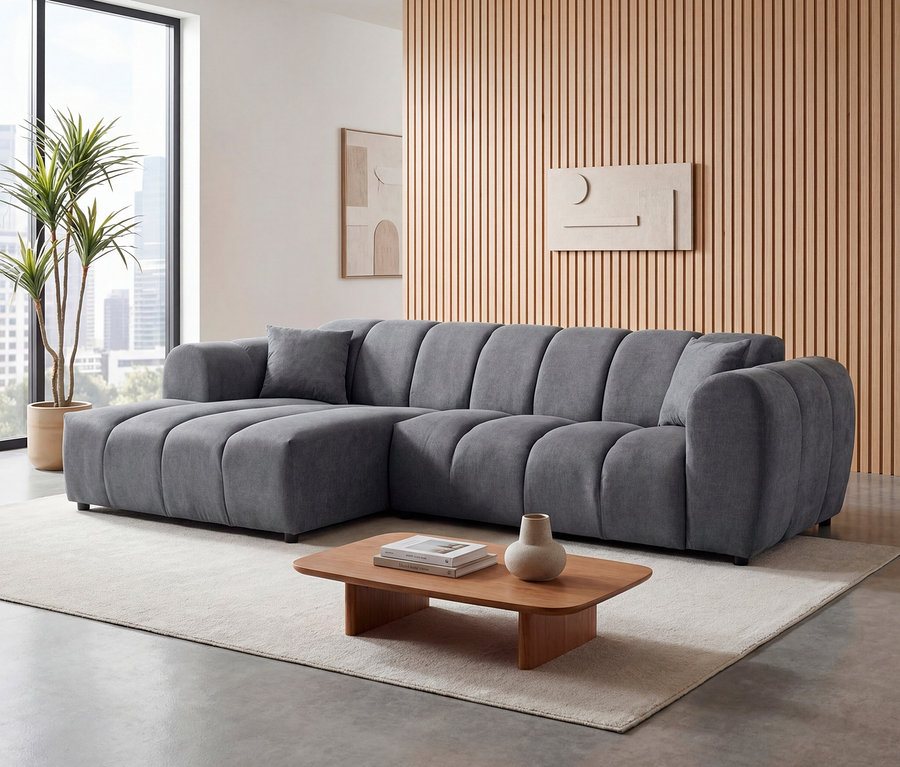 Grauer Longchair links mit Sofa 2-Sitzer rechts »Loftwave« steht im Wohnzimmer.