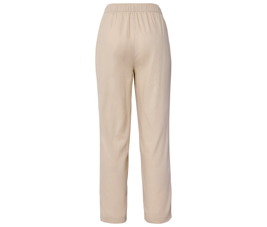 Beige Hose mit Gummibund, von hinten fotografiert.