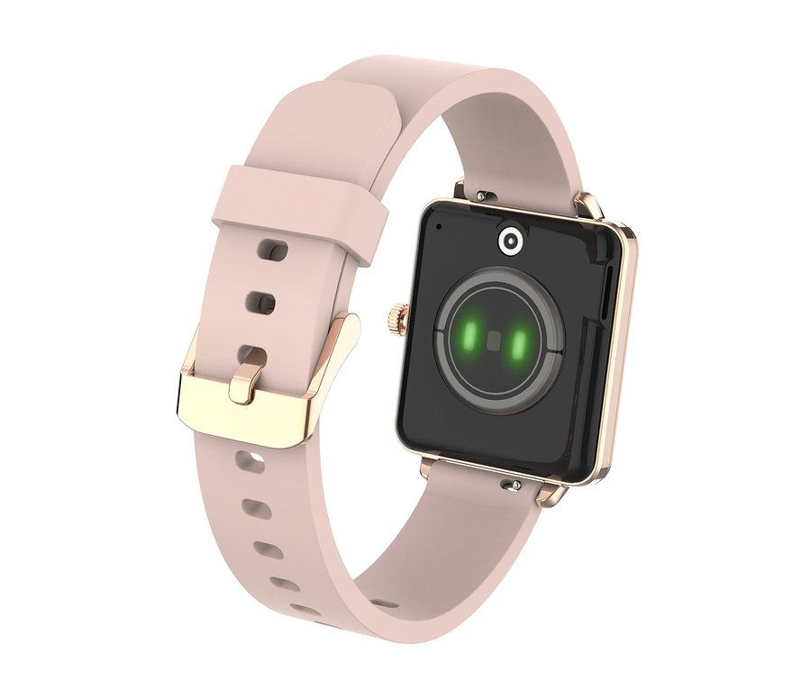 Eine Smartwatch mit quadratischem, roségoldenem Gehäuse und hellrosa Armband. Die Rückseite zeigt einen schwarzen Sensorbereich mit zwei leuchtenden grünen Lichtern und einer kleinen Kameralinse. Eine roségoldene Schnalle ist am Armband sichtbar, und eine goldene Krone an der Seite des Gehäuses.