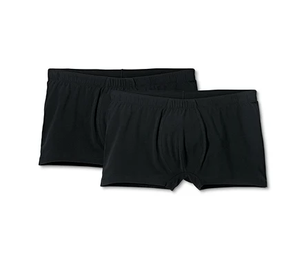 Zwei schwarze Herren Boxershorts liegen nebeneinander.