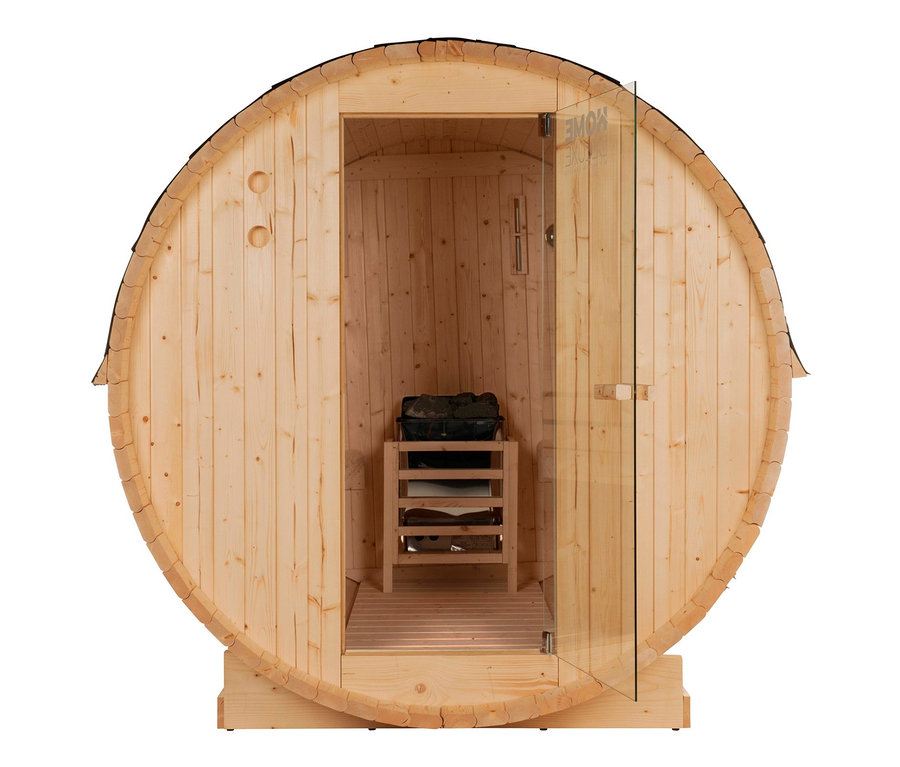 Foto einer Home-Deluxe-Outdoor-Fasssauna »LAHTI L« mit offener Glastür, im Inneren befinden sich Heizsteine.