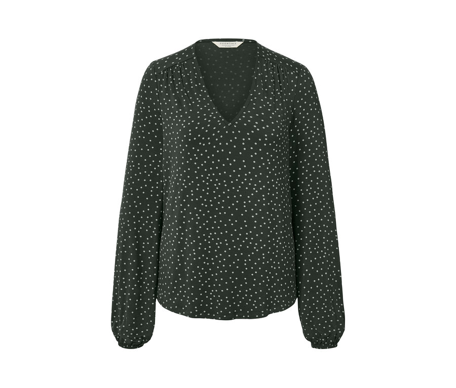 Abgebildet ist ein gepunktetes Blusenshirt.