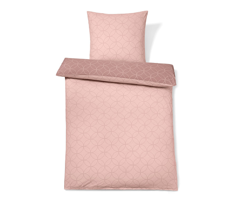 Rosa Winterjersey-Bettwäsche mit Kreismuster.