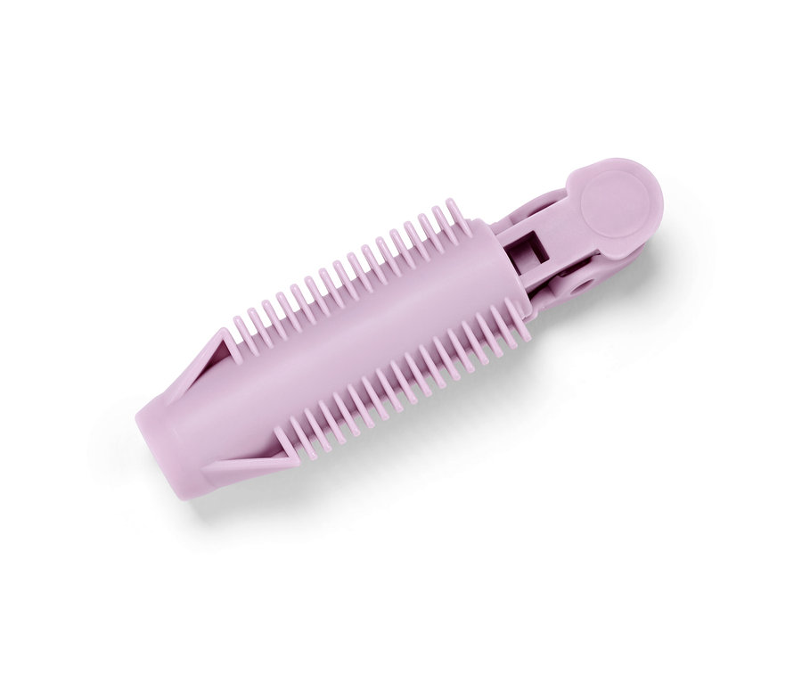 Nahaufnahme von einem rosa 6 Ansatz-Volumen-Clips.