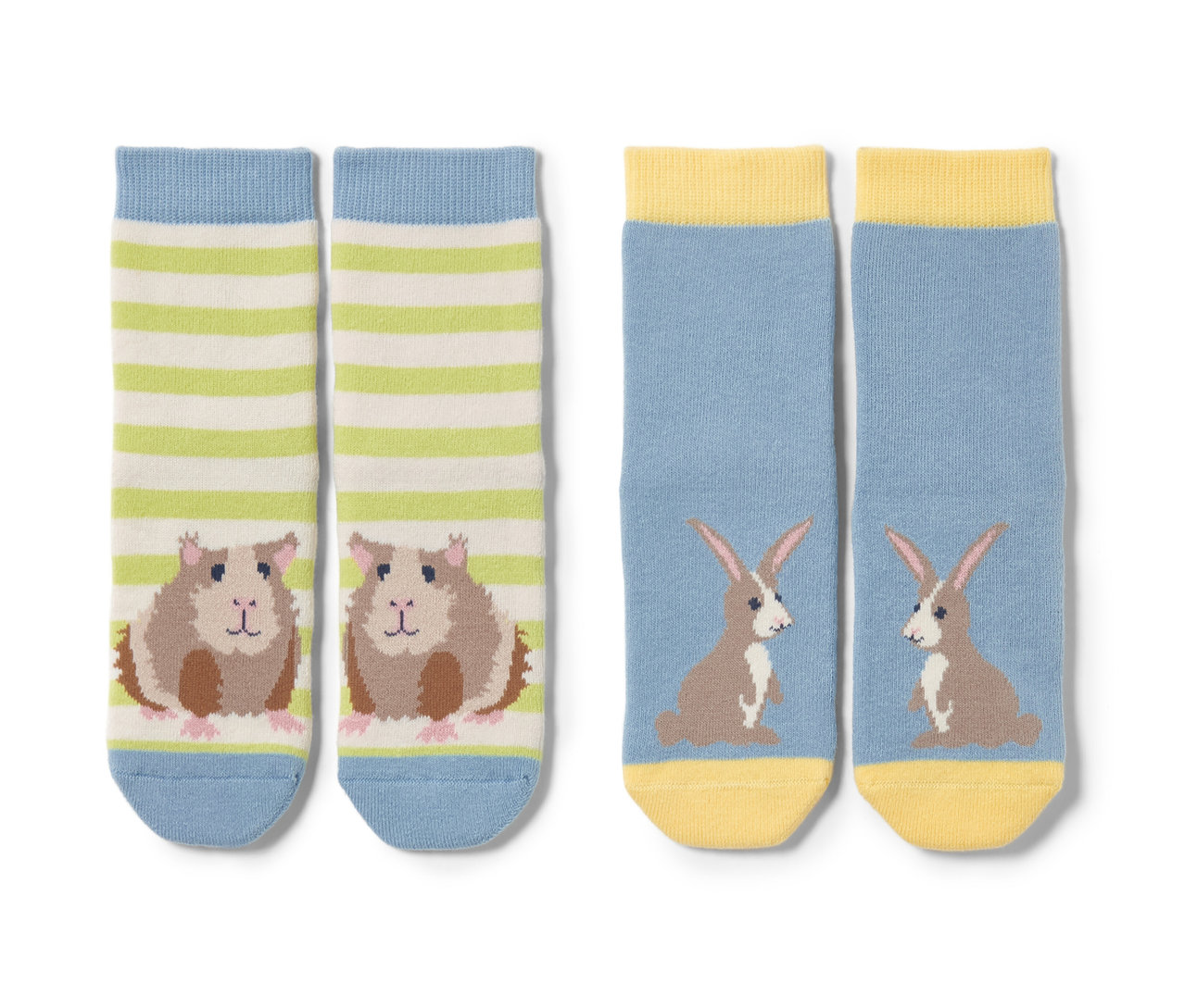 Zwei Paar Kleinkind-Antirutsch-Socken, eines mit Meerschweinchen und Streifen, das andere mit Kaninchen.