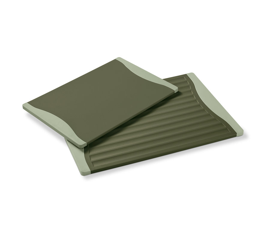 Zwei grüne Schneidebretter.