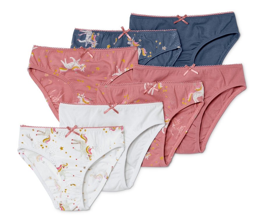 Sieben Mädchen-Slips in verschiedenen Farben und Mustern mit Einhörnern.