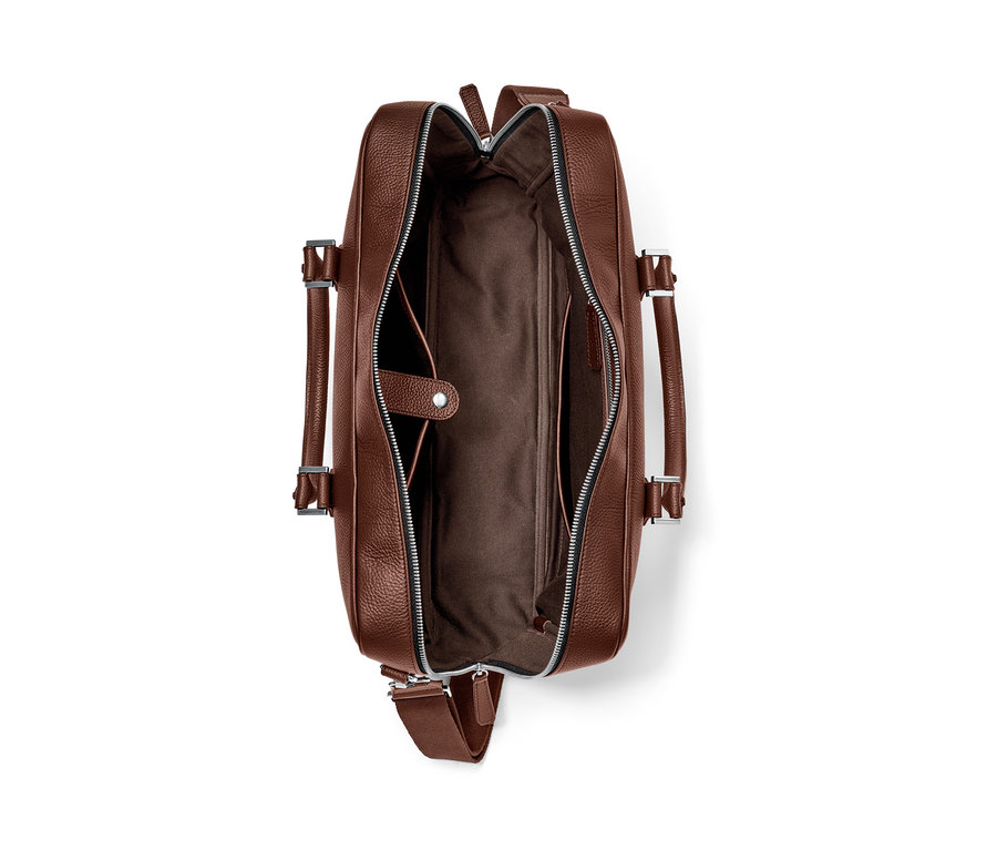 Geöffnete braune Leder-Aktentasche »Goldpfeil«.