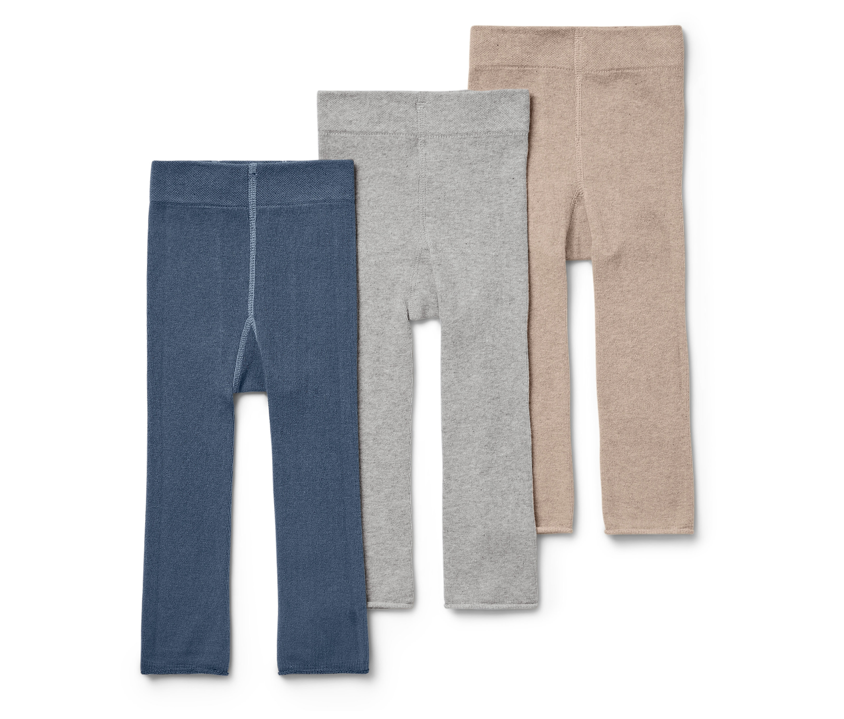 Drei Kinder Leggings in blau, grau und beige nebeneinander.
