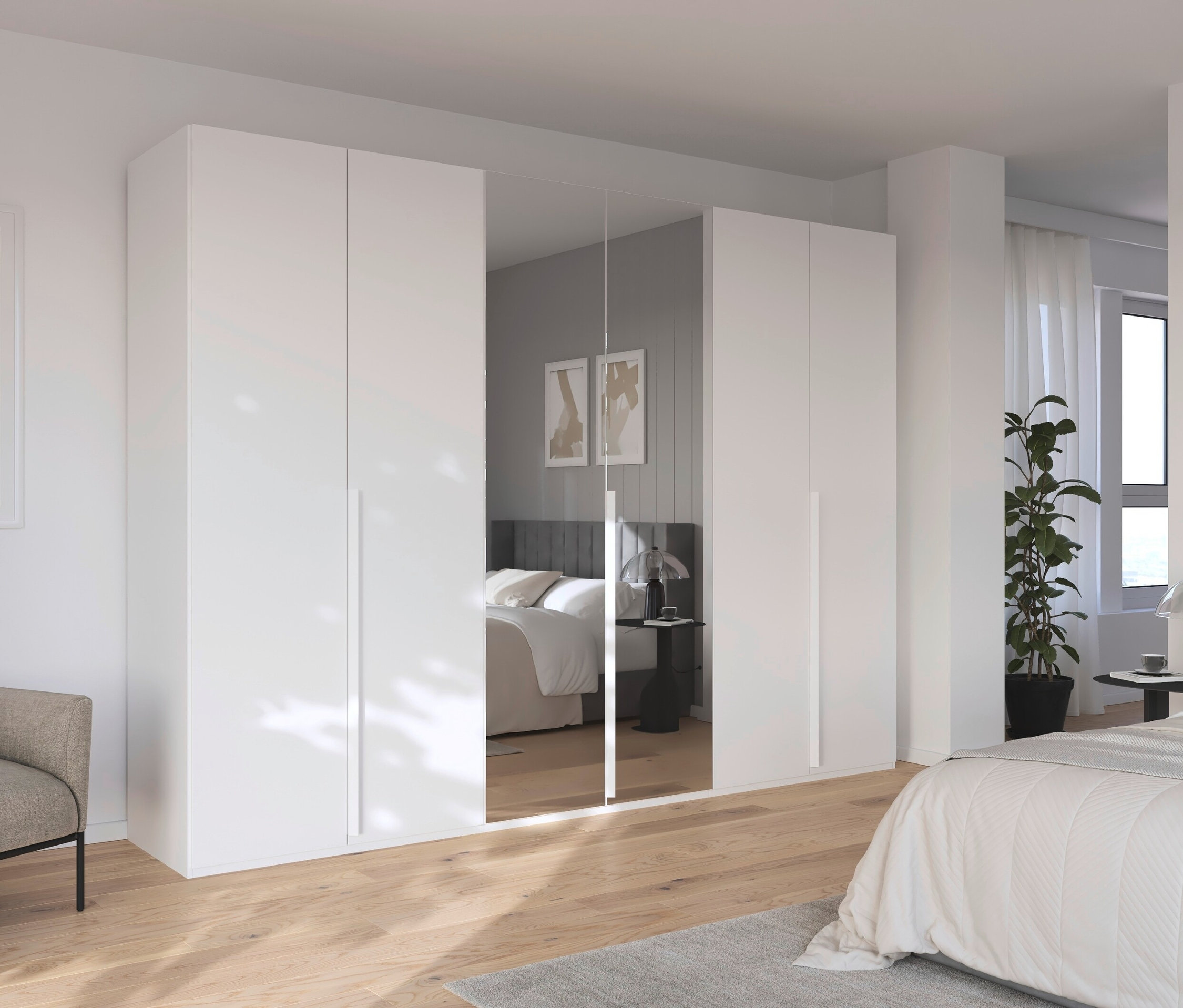 Schlafzimmer mit weißen Schränken und Bett.