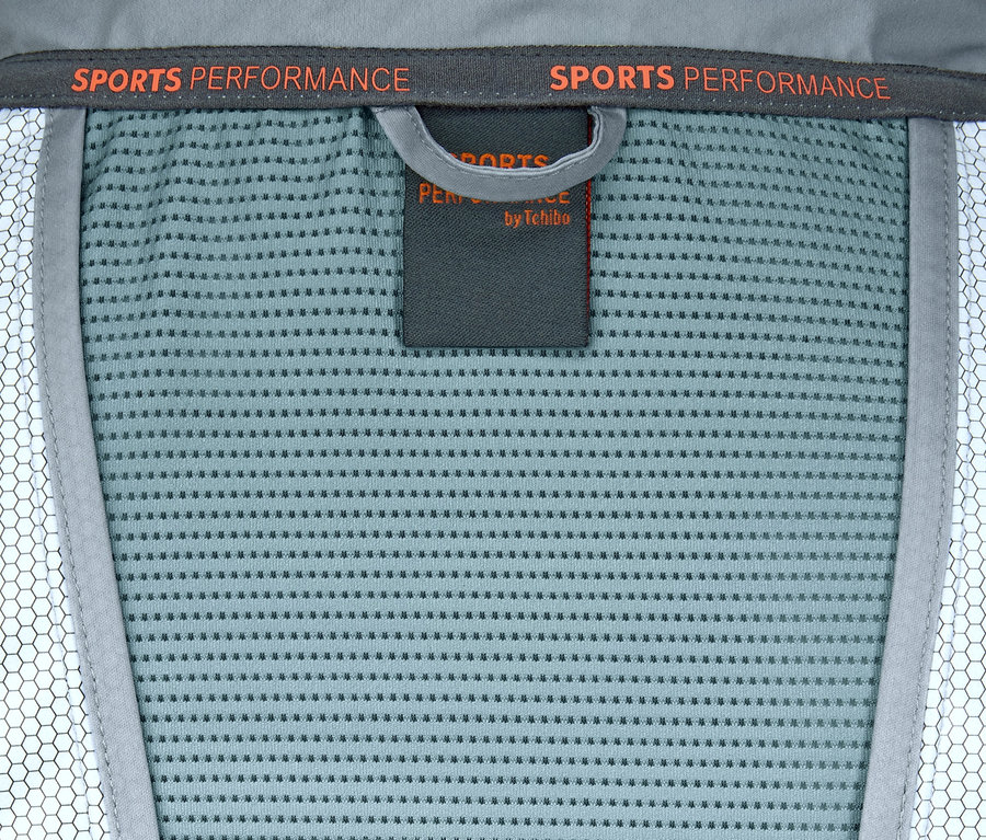 Detailansicht der grauen Windprotection-Funktionsjacke.