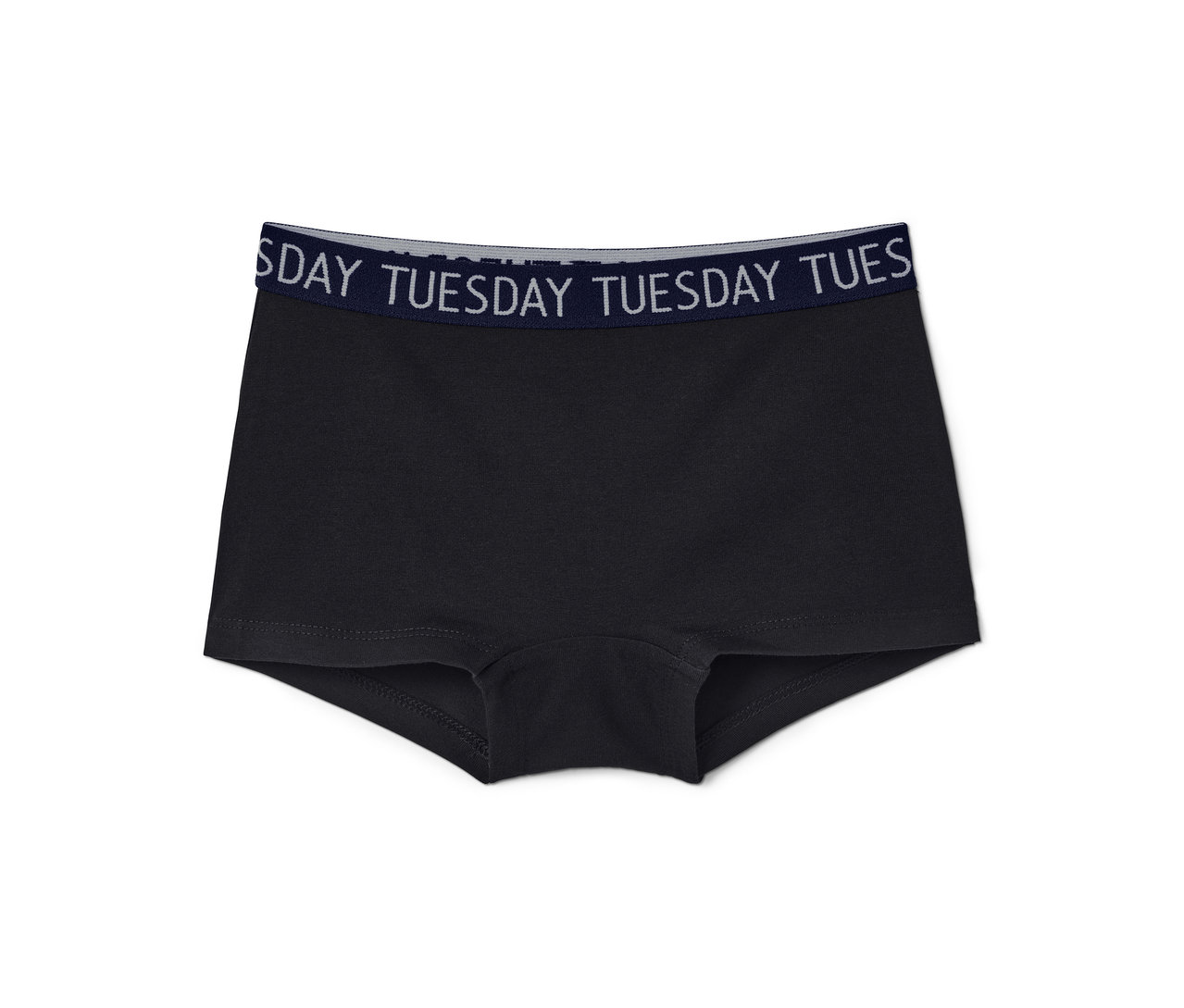Eine einzelne schwarze 7 Mädchen-Pantys mit dem Aufdruck "TUESDAY" auf dem Bund.