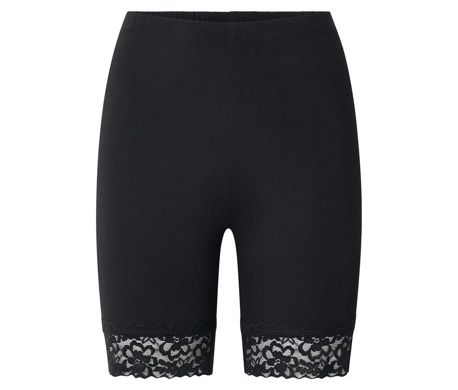Schwarze, kurze Leggings mit Spitzenabschluss.
