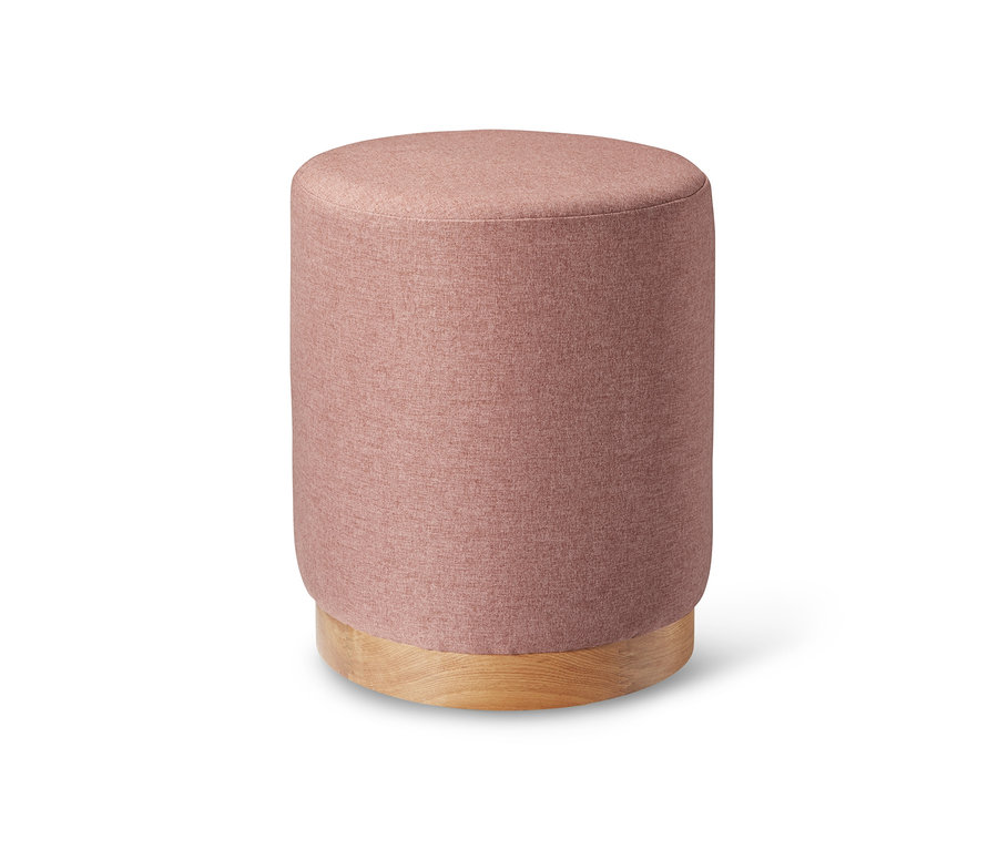 Rosa gepolsterter Hocker mit Eichenholzsockel.