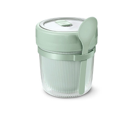 Ein grüner To-go-Suppenbehälter mit Löffel.