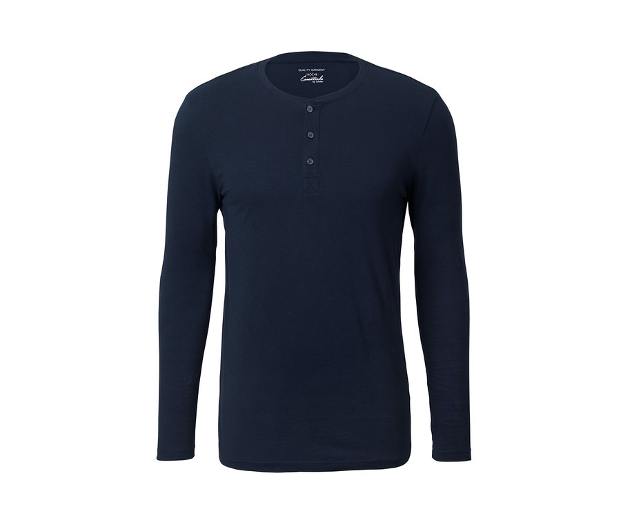 Ein marineblauer Flanell-Pyjama mit langen Ärmeln und Knöpfen.