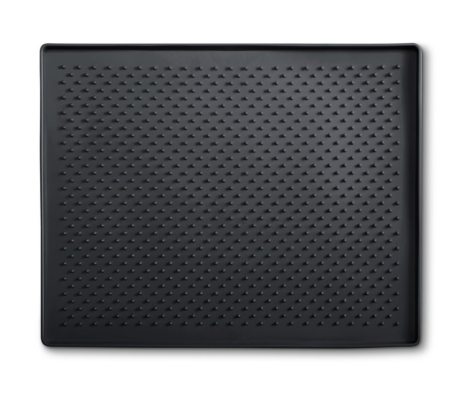 Schwarze Schuhabtropfmatte mit Noppen.