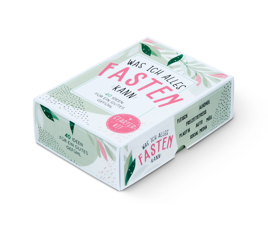 Eine weiße Schachtel des Starter-Kits Fasten: »Was ich alles fasten kann« mit rosa Schrift.