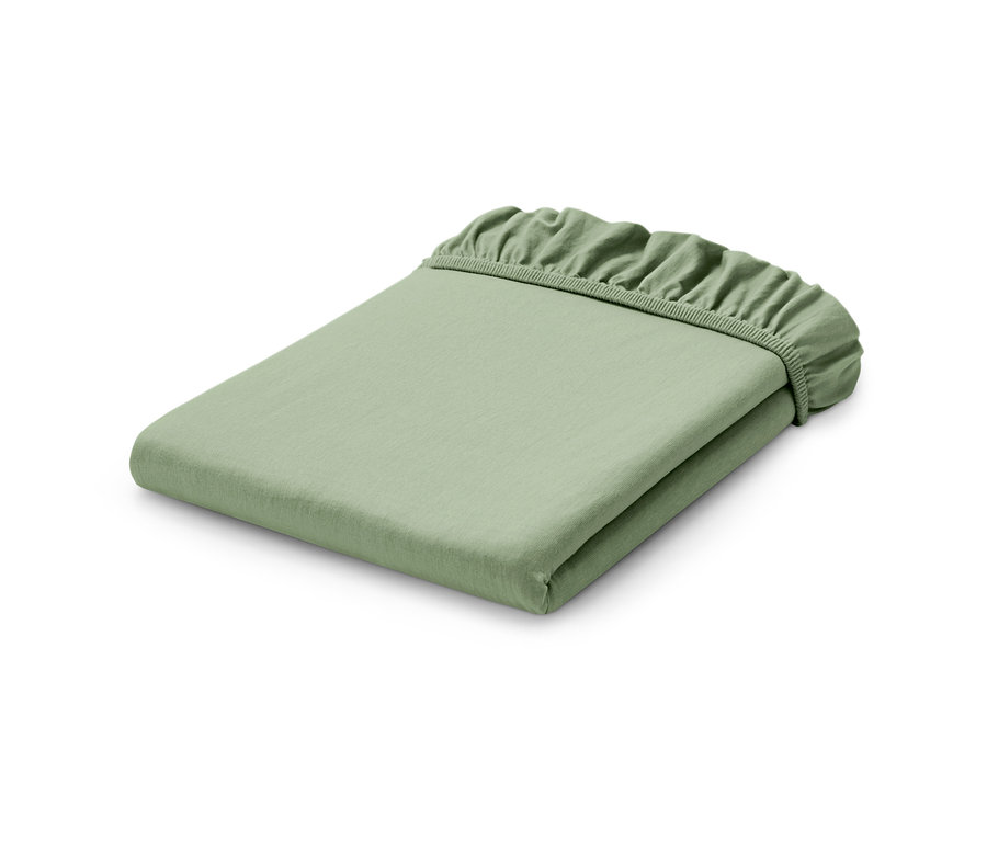 Gefaltetes, salbeigrünes Premium-Jersey-Spannbettlaken.