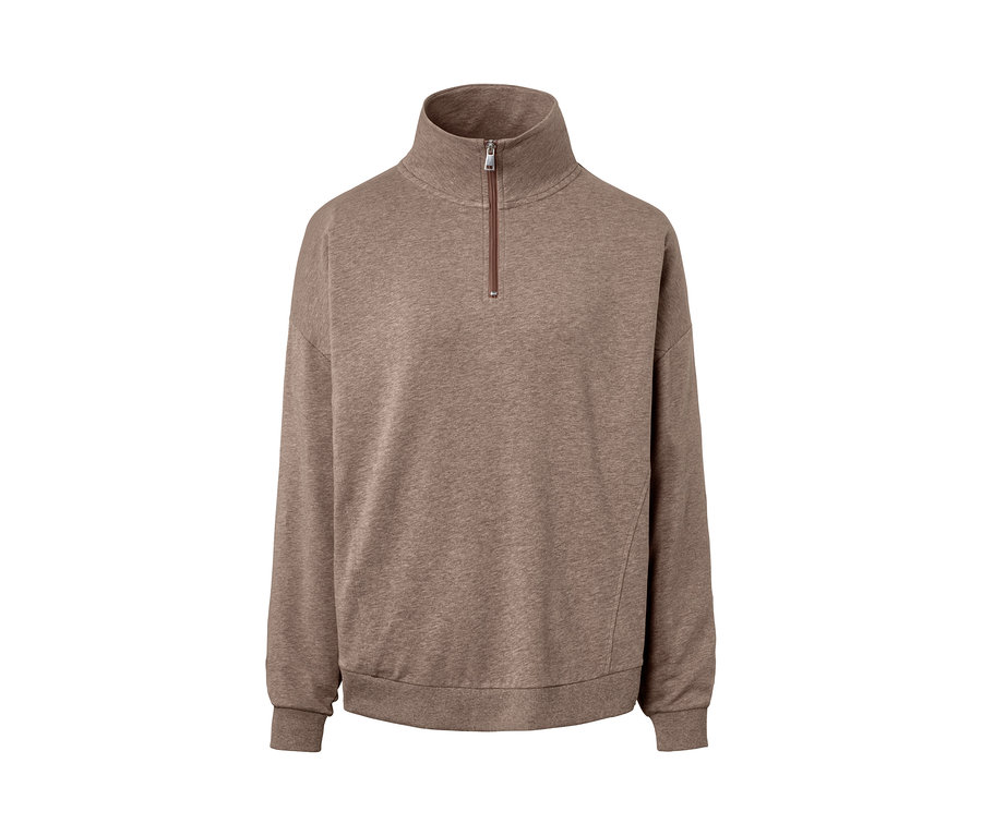 Ein Loungewear-Sweater in Beige mit Reißverschluss.