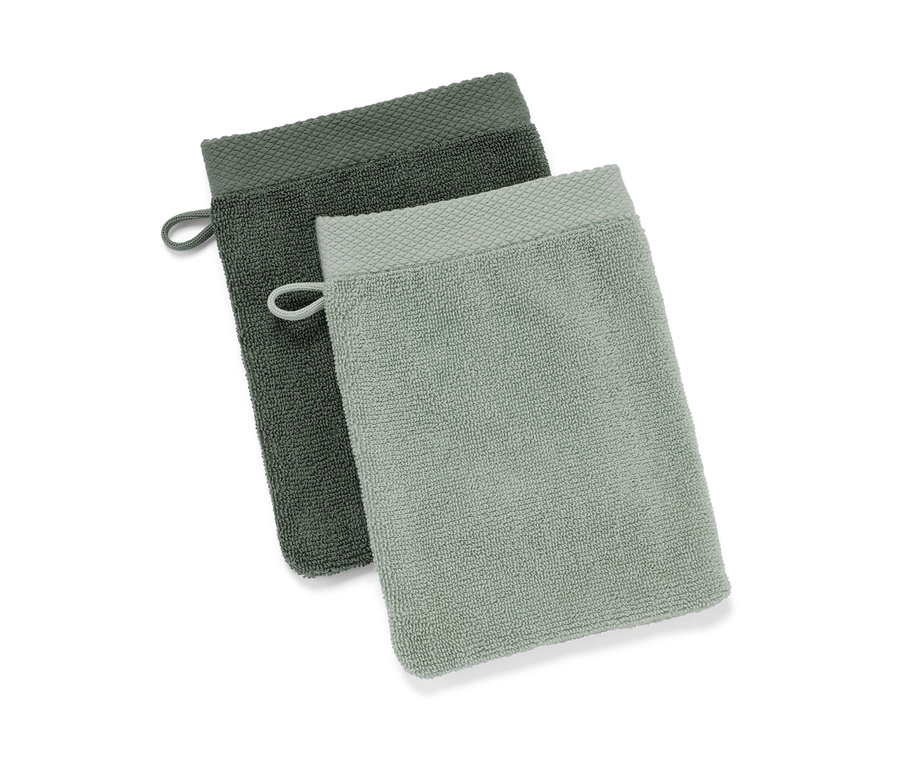 Zwei hochwertige Waschlappen, eins grau und eins hellgrau.