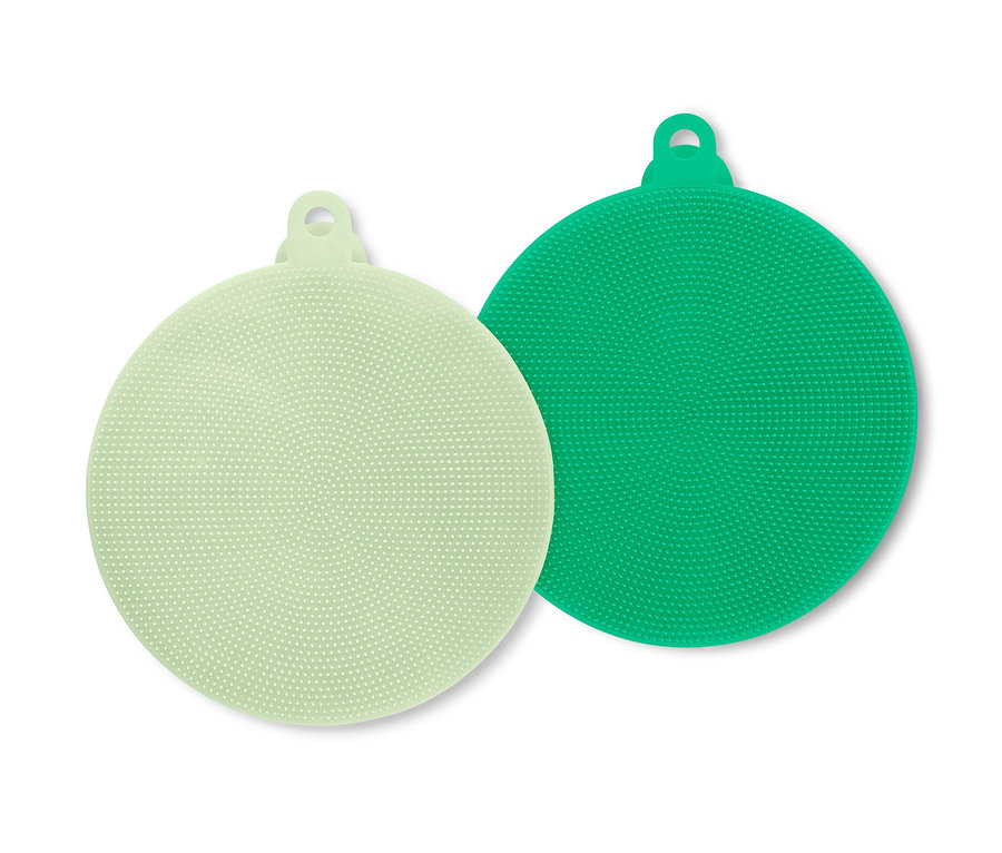 Zwei grüne und hellgrüne Silikon-Abwaschpads.