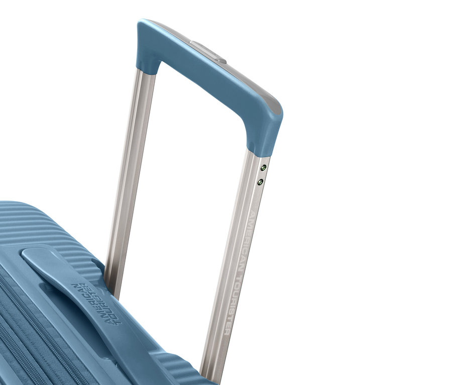 Detailansicht eines blauen American Tourister Soundbox Spinner Hartschalen-Koffers mit ausziehbarem Griff.