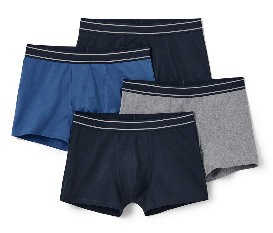 Vier Slipboxer in Blau, Grau und zweimal Dunkelblau.