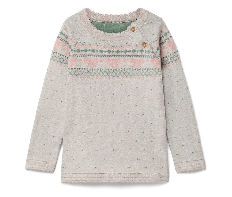 Langärmliger Pullover mit rosa-grünem Muster auf der Brust und kleinen Punkten auf dem gesamten Pullover.
