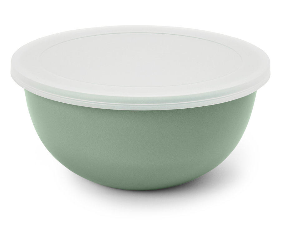 Eine grüne Schüssel mit einem weißen Deckel.