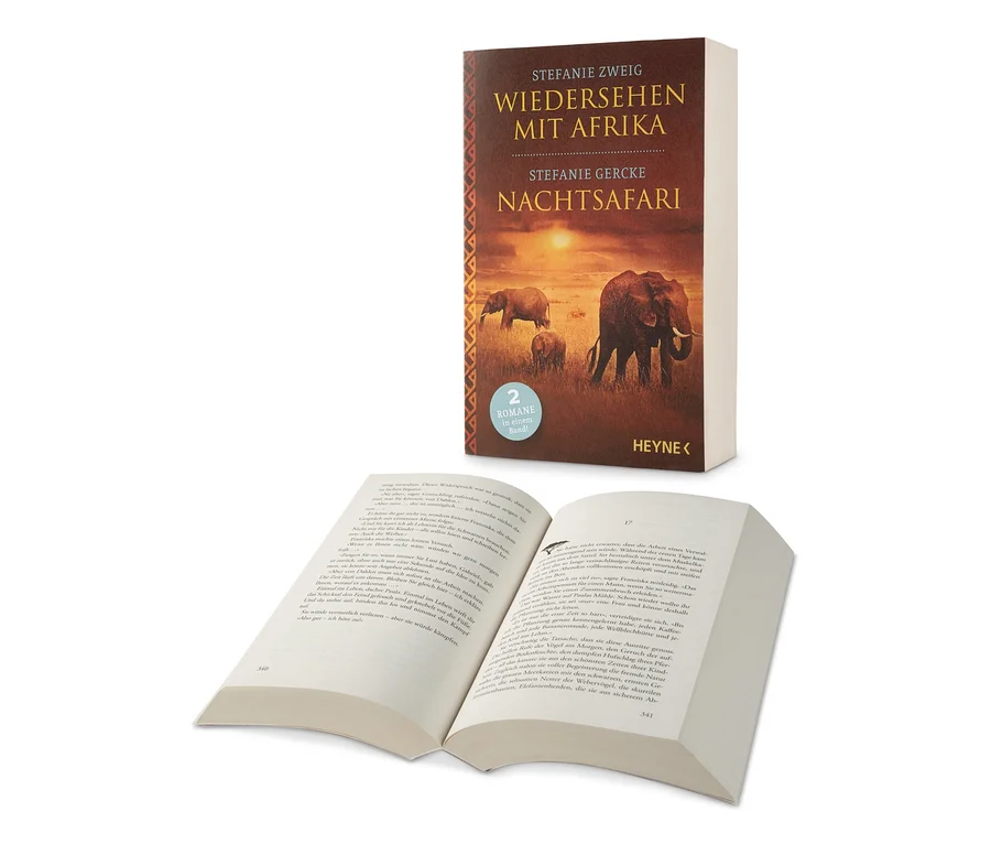 Doppelroman »Wiedersehen mit Afrika« und »Nachtsafari« und ein offenes Buch liegen auf einem weißen Hintergrund.