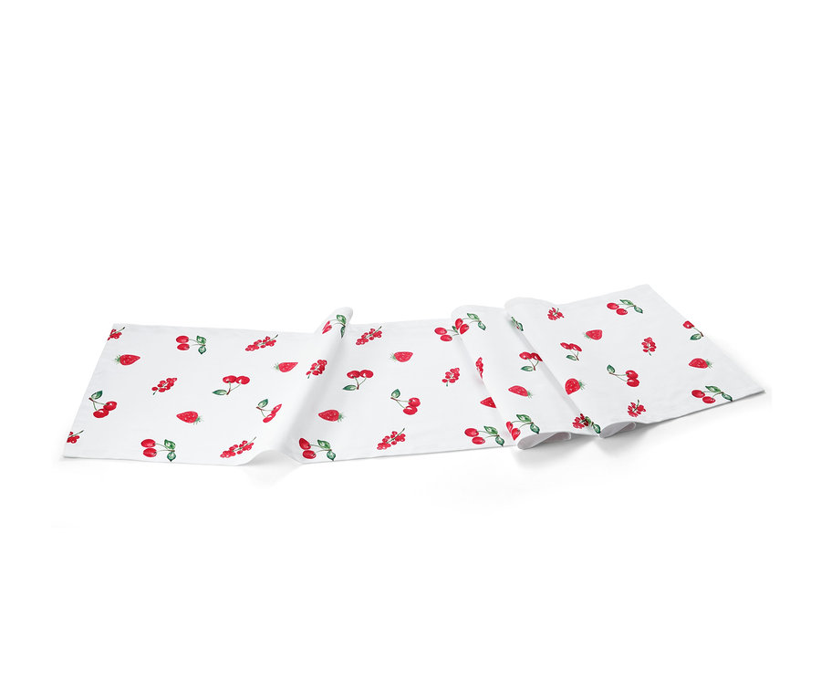 Tischläufer mit Fruchtmuster.