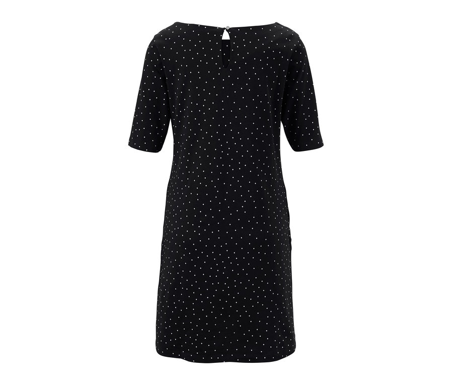 Ein Jerseykleid im Punkte-Dessin.