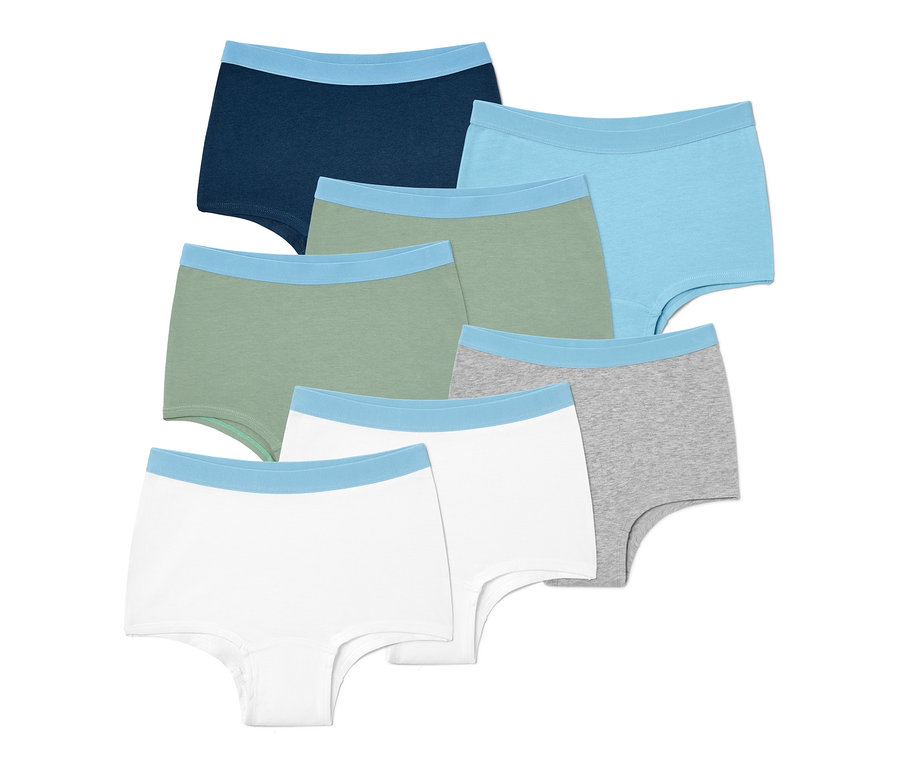 Sieben Mädchen-Pantys in verschiedenen Farben.
