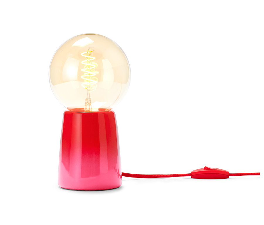 Eine rote LED-Tischleuchte mit Glühbirne.