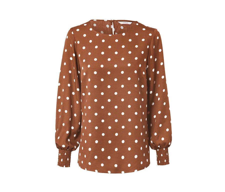 Eine braune, gepunktete Bluse.