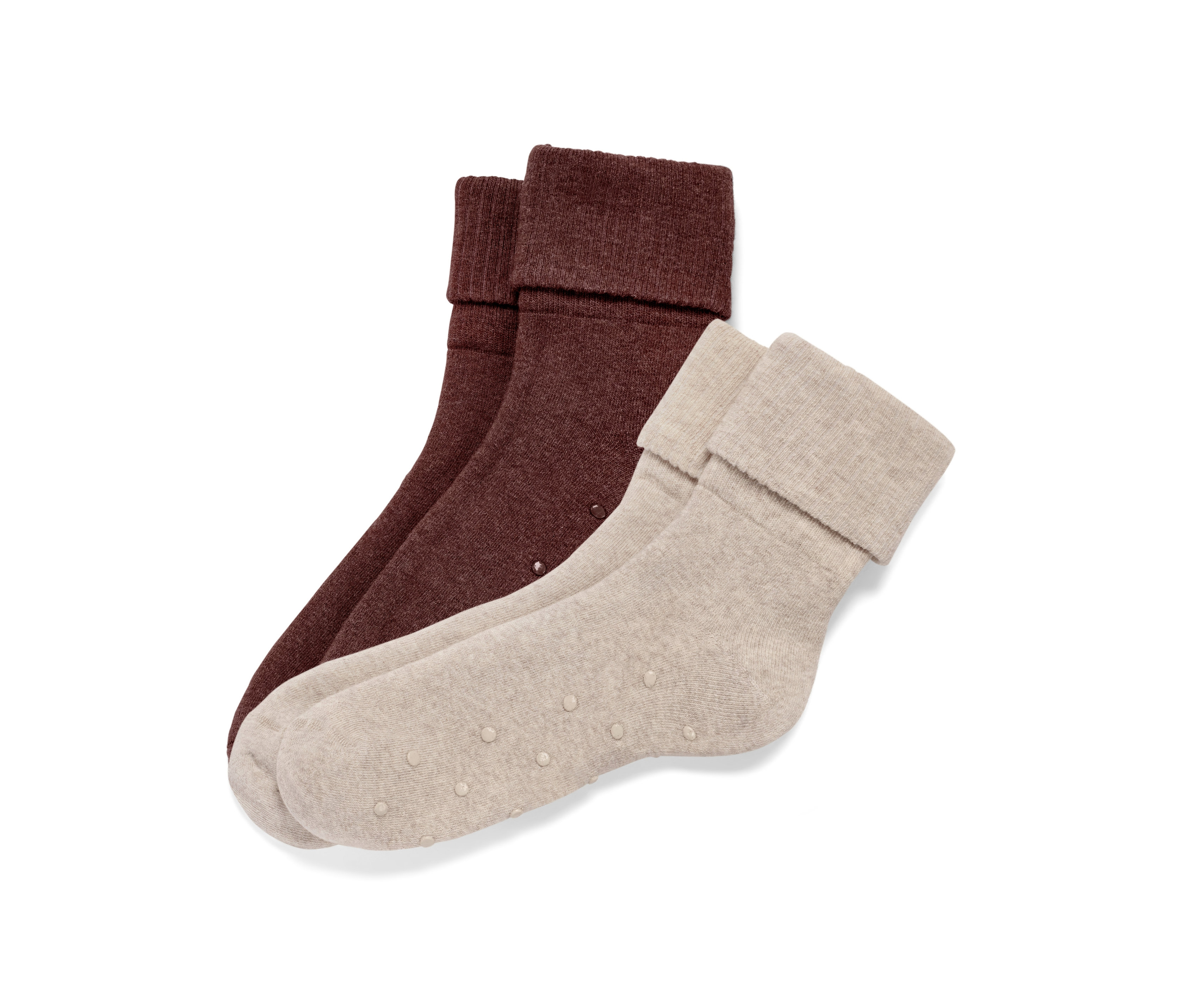 Zwei Paar Stoppersocken, ein Paar braun und ein Paar beige.