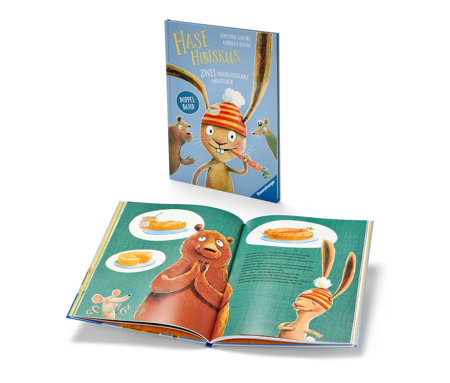Aufgeschlagenes Buch »Hase Hibiskus« zeigt Bär- und Hasenillustration. Oben liegt ein geschlossenes Buch »Hase Hibiskus«.