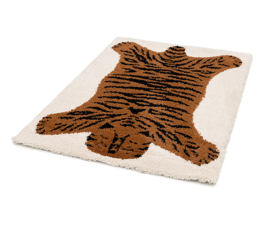 Ein Kinderteppich NOMAD Tiger, ca. 120 x 170 cm, liegt auf dem Boden.
