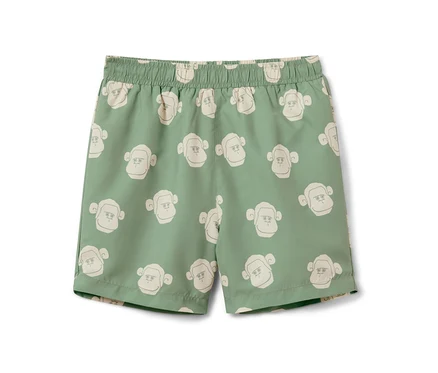 Grüne Kinder-Boardshorts mit Affenmuster.
