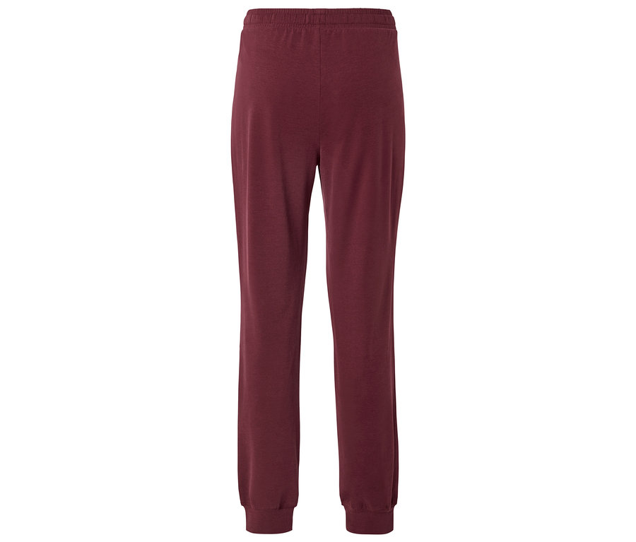 Weinrote Jogginghose mit elastischem Bund und Bündchen an den Beinabschlüssen.